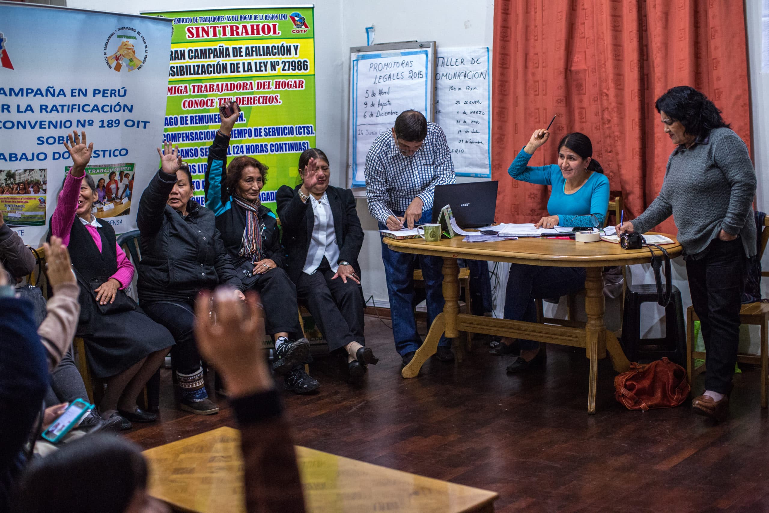 Worker leaders and partners meeting in discussion